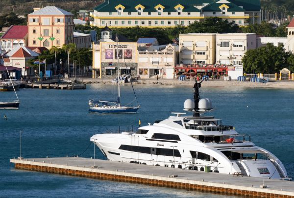 Airport runway and boats in the surrounding St. Maarten waters